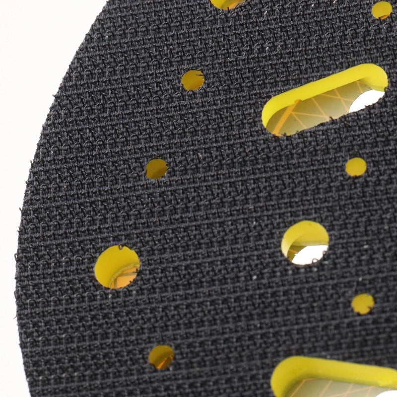 Backing pad with dust extraction hole pattern
